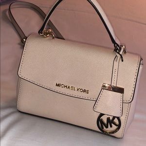 Micheal Kors small pink crossbody.